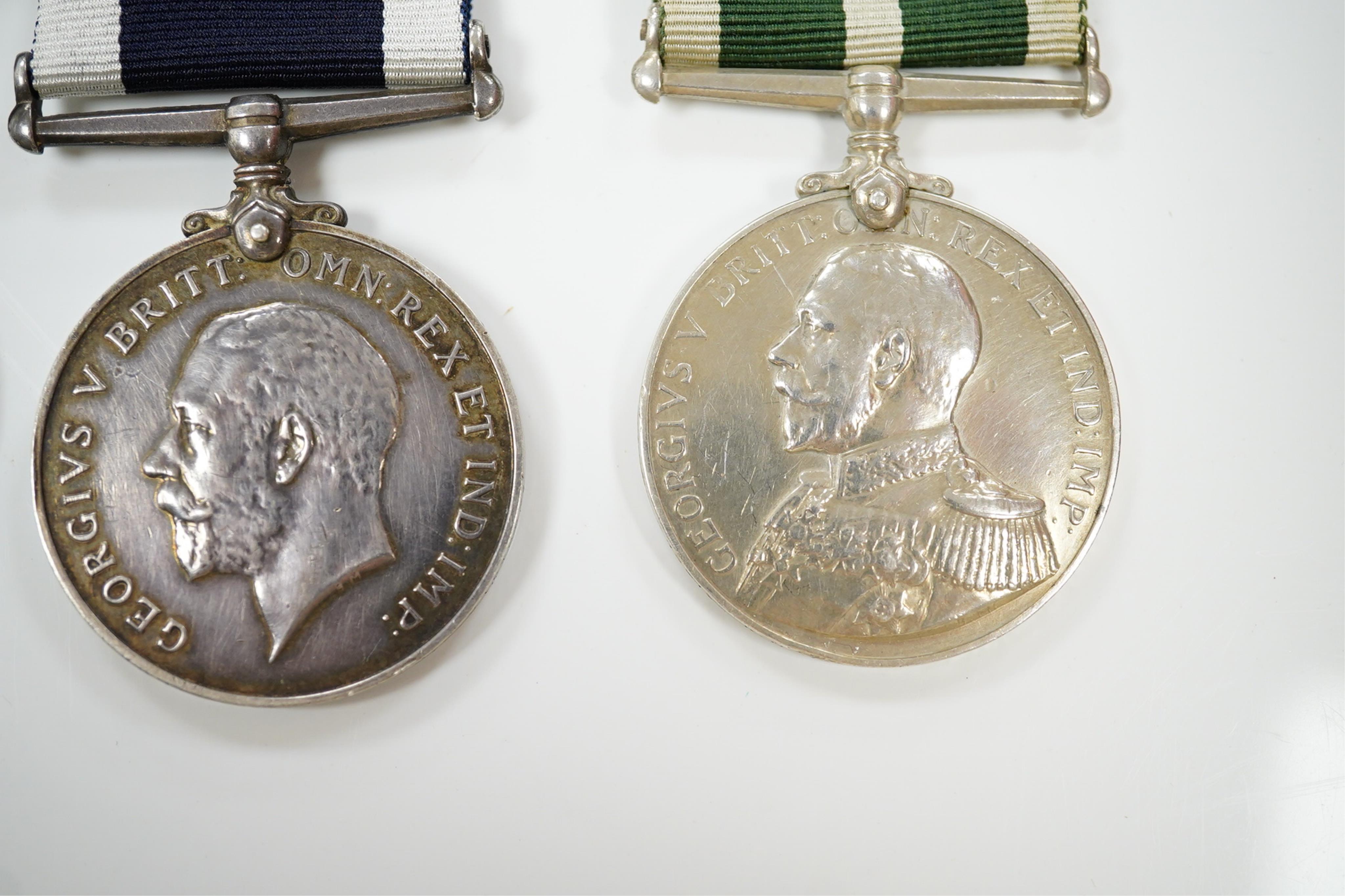 Four assorted Naval service medals; EVII Royal Naval Reserve LSGC to V.440. W.Lewis, STO.RNR.; GV Royal Fleet Reserve LSGC unnamed; GV RNLSGC (renamed) to J,87119 R.S. J.West. A.B.H.M.S.Victory; GV RNRLSGC to 1361V W.H.J